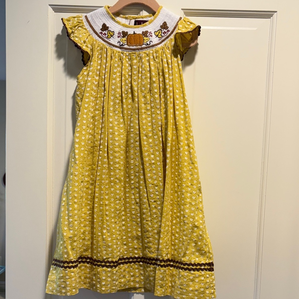 Charming Yellow Kids Dress with Pumpkin Embroidered Design and Smocking